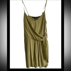 • Title
One Clothing Women's Green 100% Rayon Short Romper withTie
Straps Size S